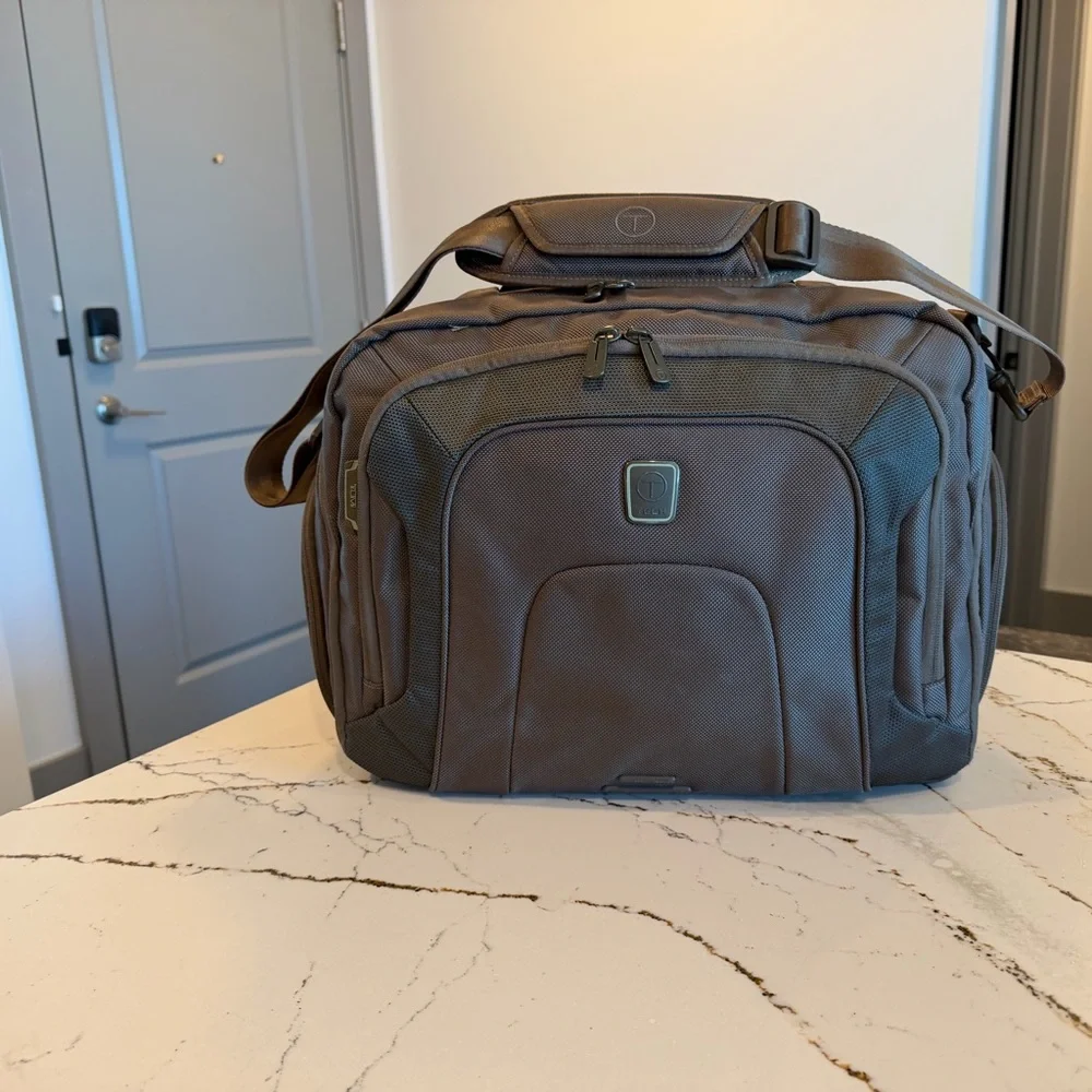 Tumi Brown Backpack with Multiple Compartments